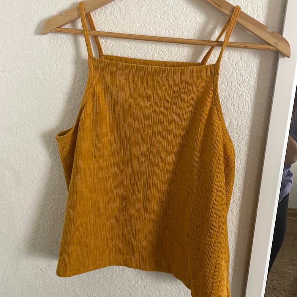 this is a one of a kind tank, it’s been worn a few times but feels brand new :)